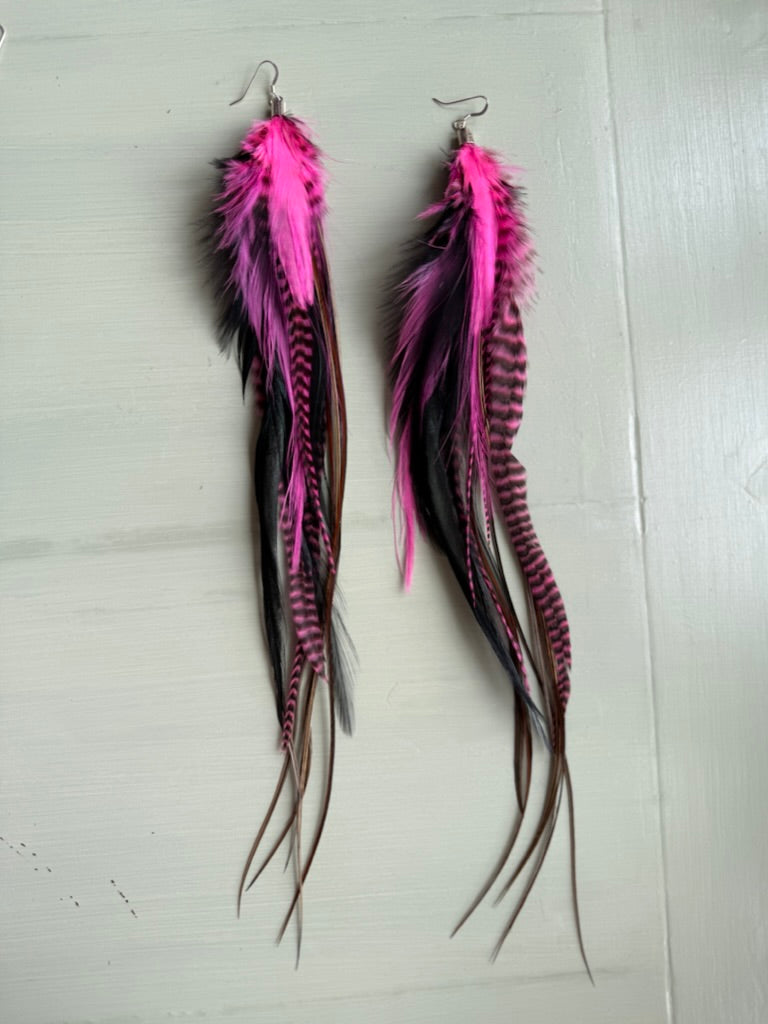 Fjäderörhängen långa