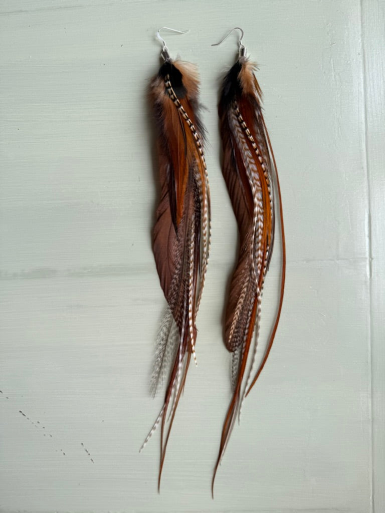 Fjäderörhängen långa