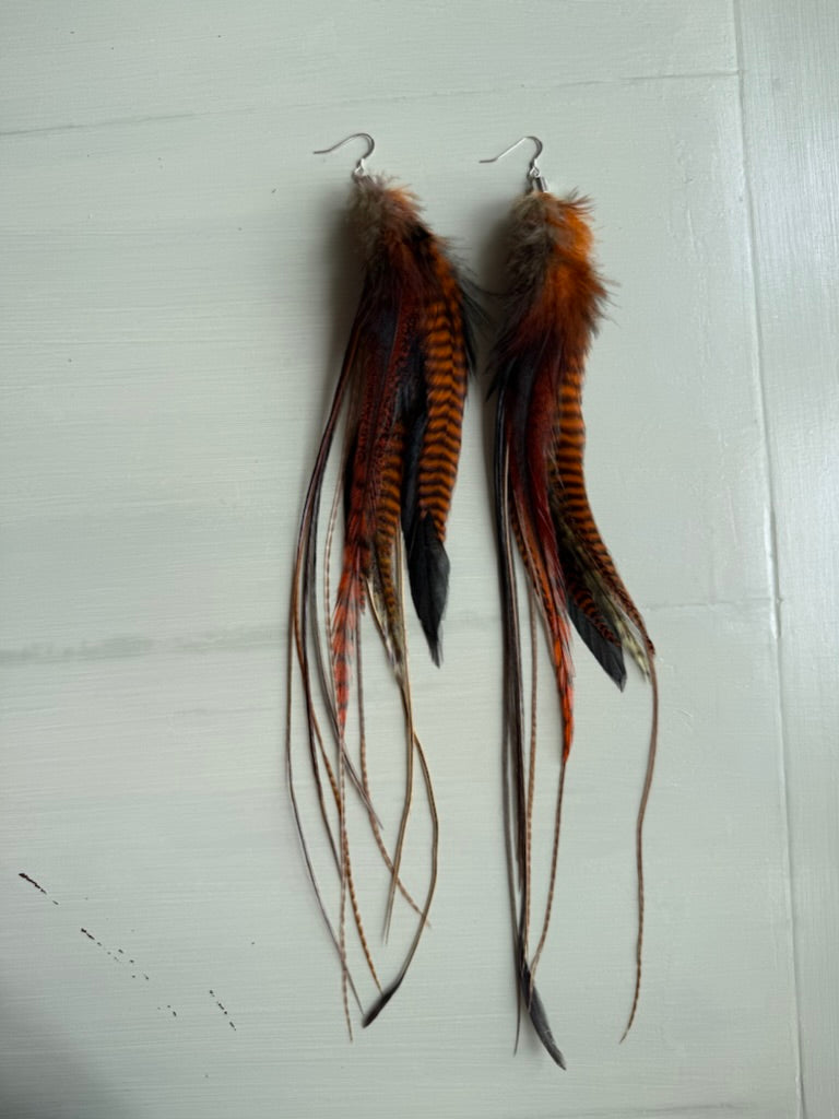 Fjäderörhängen långa