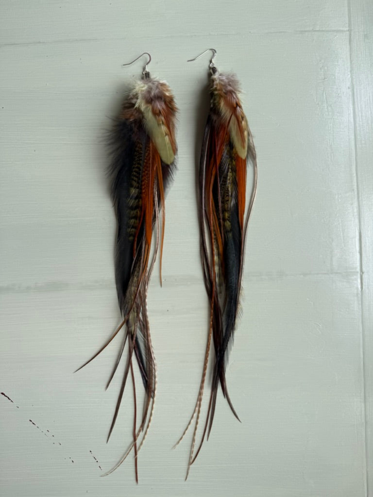 Fjäderörhängen långa