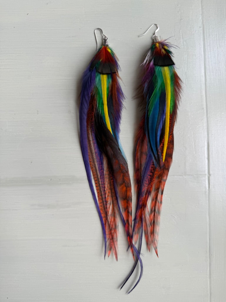 Fjäderörhängen halvlånga