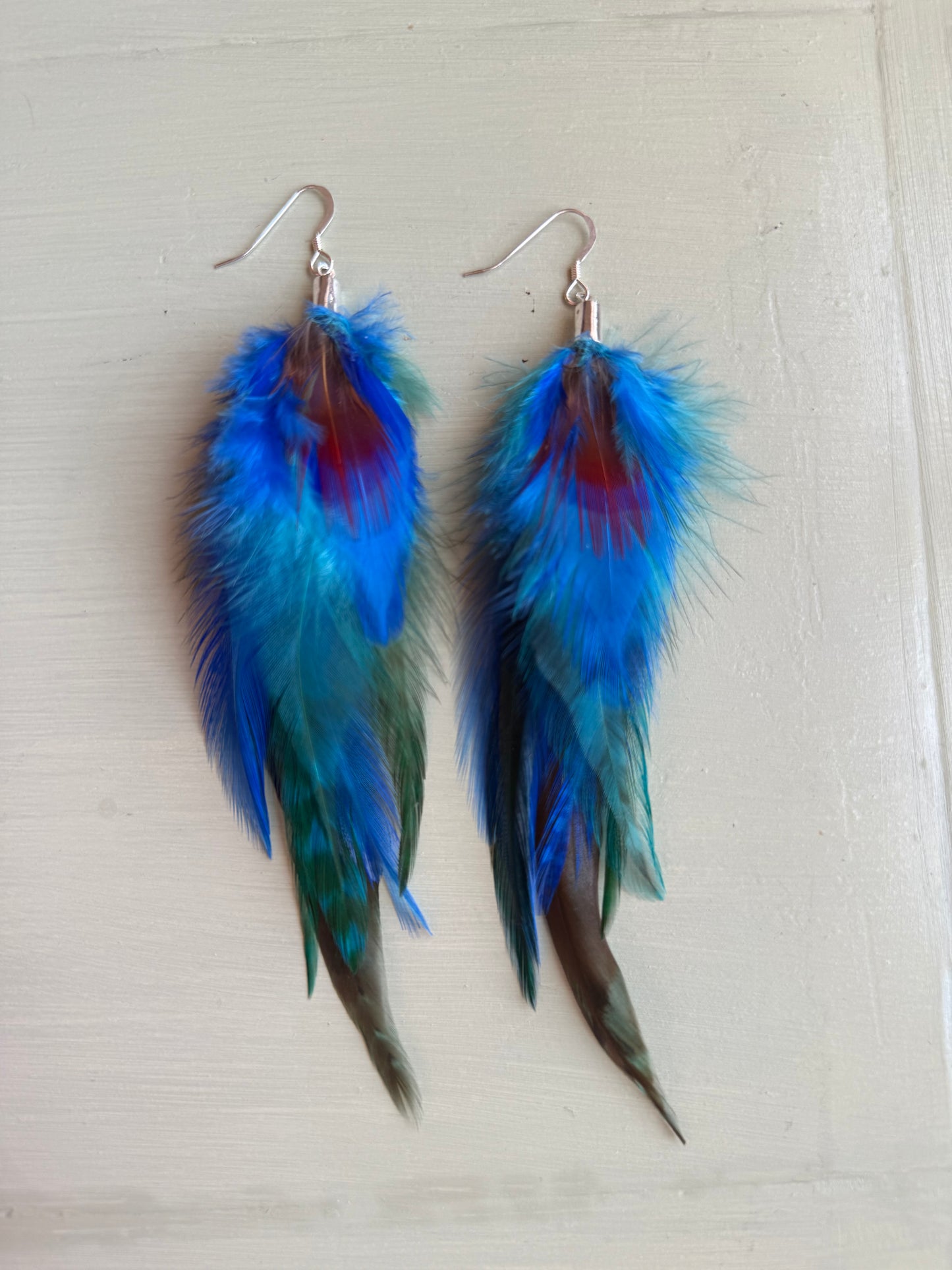 Fjäderörhängen korta