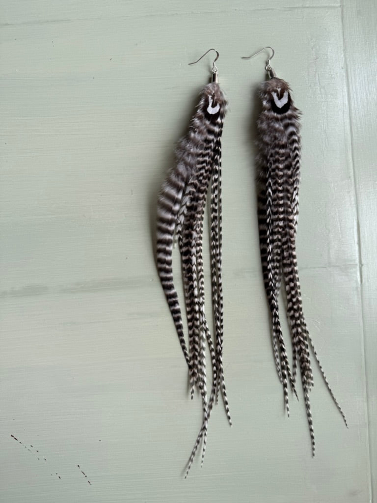 Fjäderörhängen långa