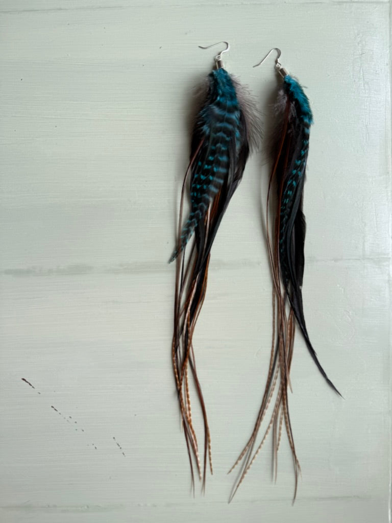 Fjäderörhängen långa