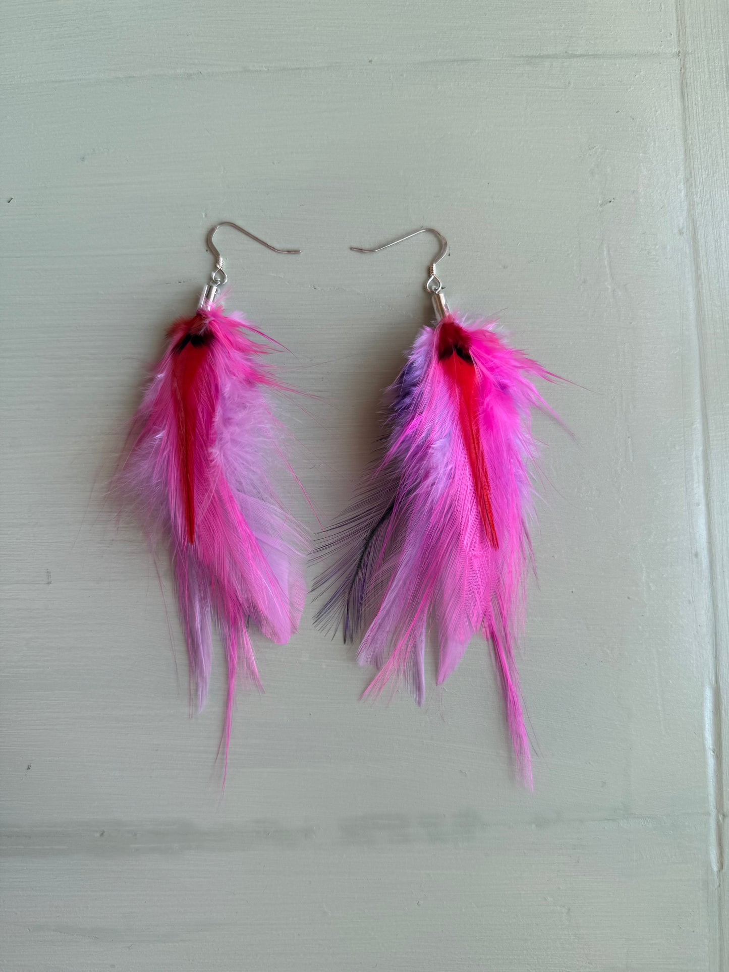 Fjäderörhängen korta