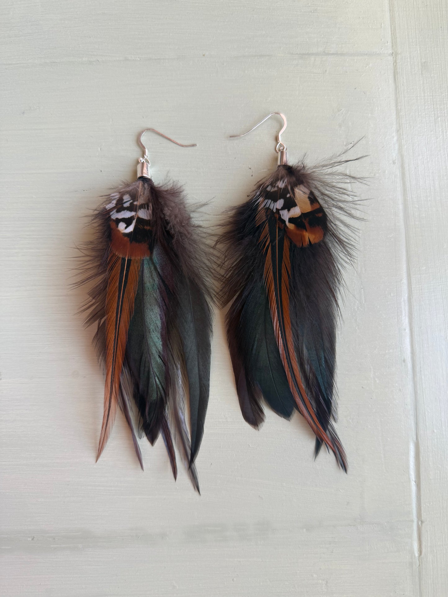 Fjäderörhängen korta