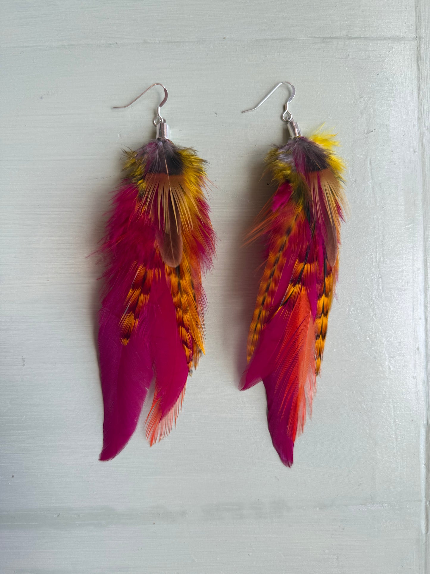 Fjäderörhängen korta