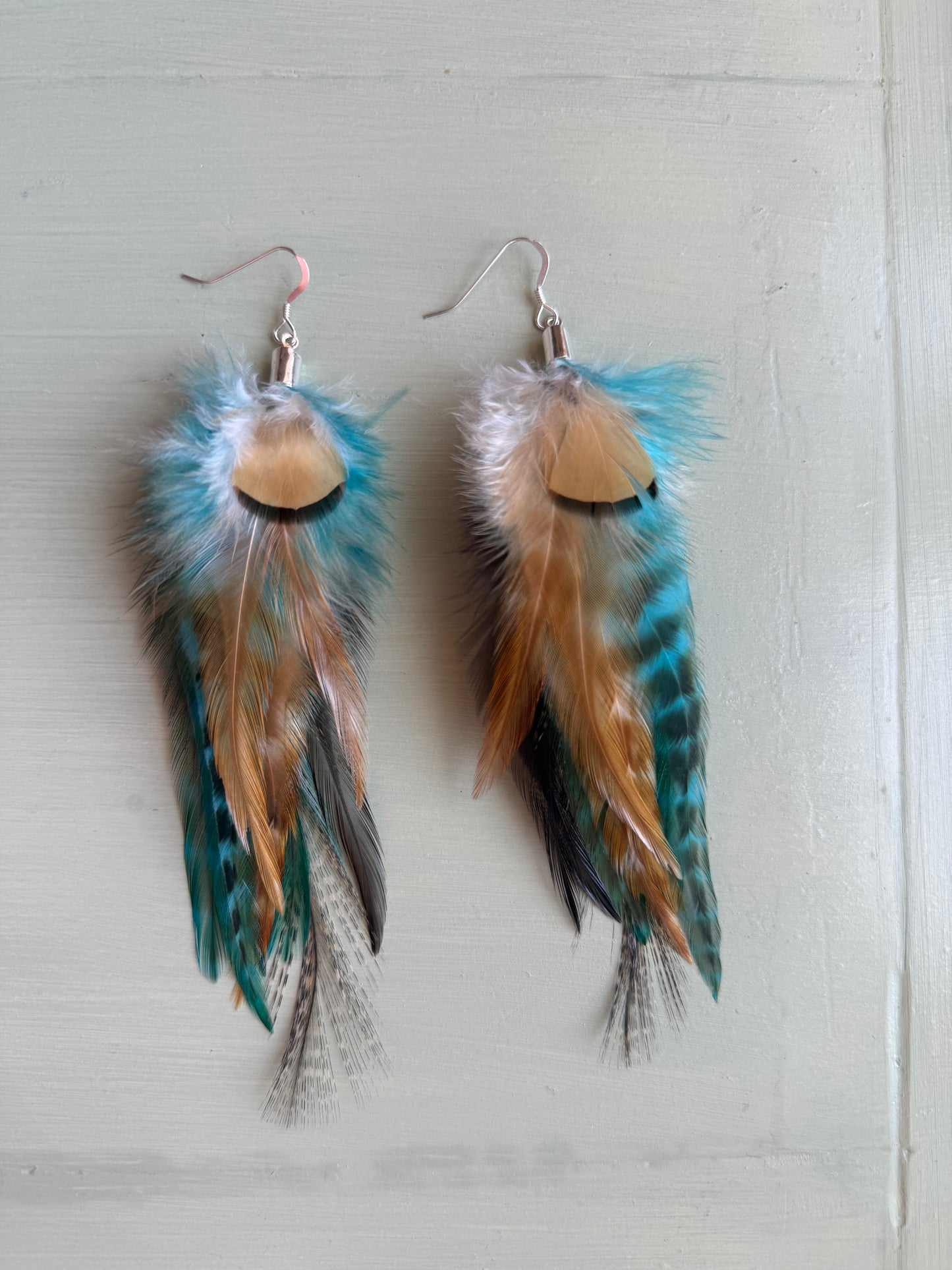 Fjäderörhängen korta