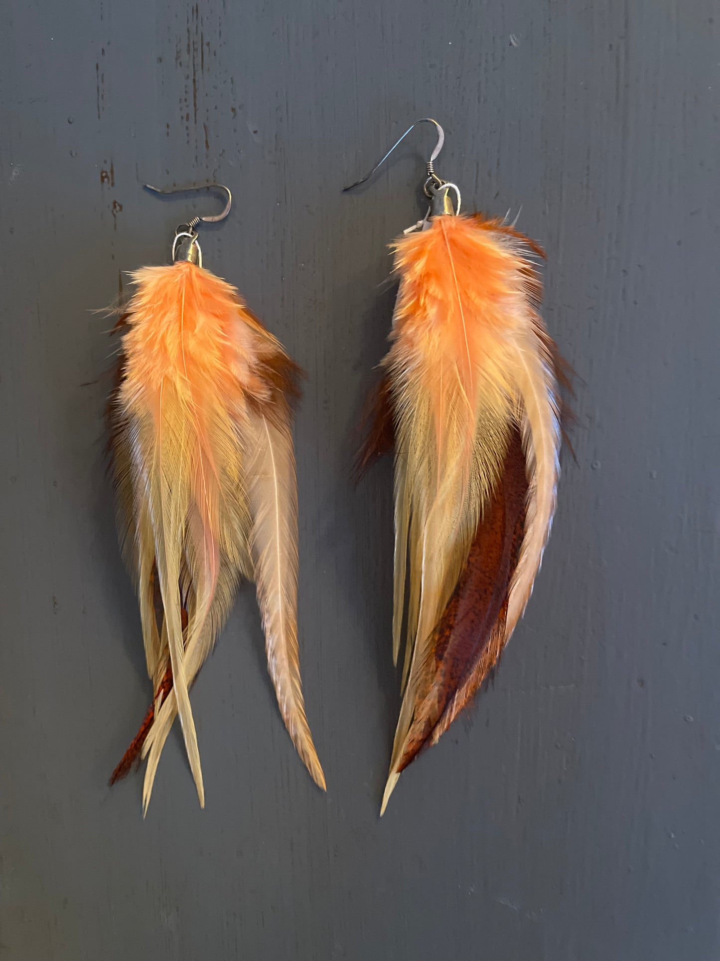 Fjäderörhängen korta