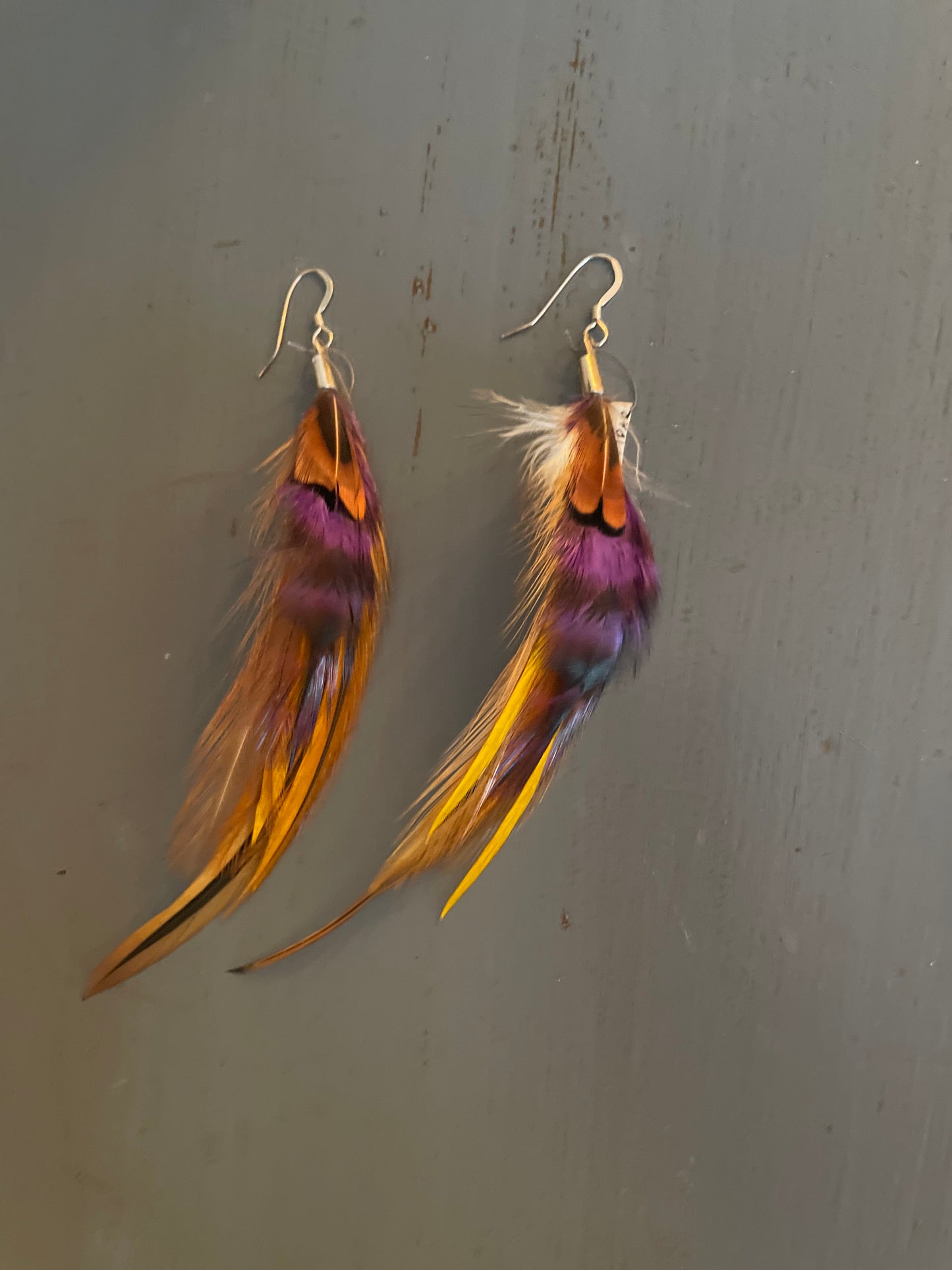 Fjäderörhängen korta