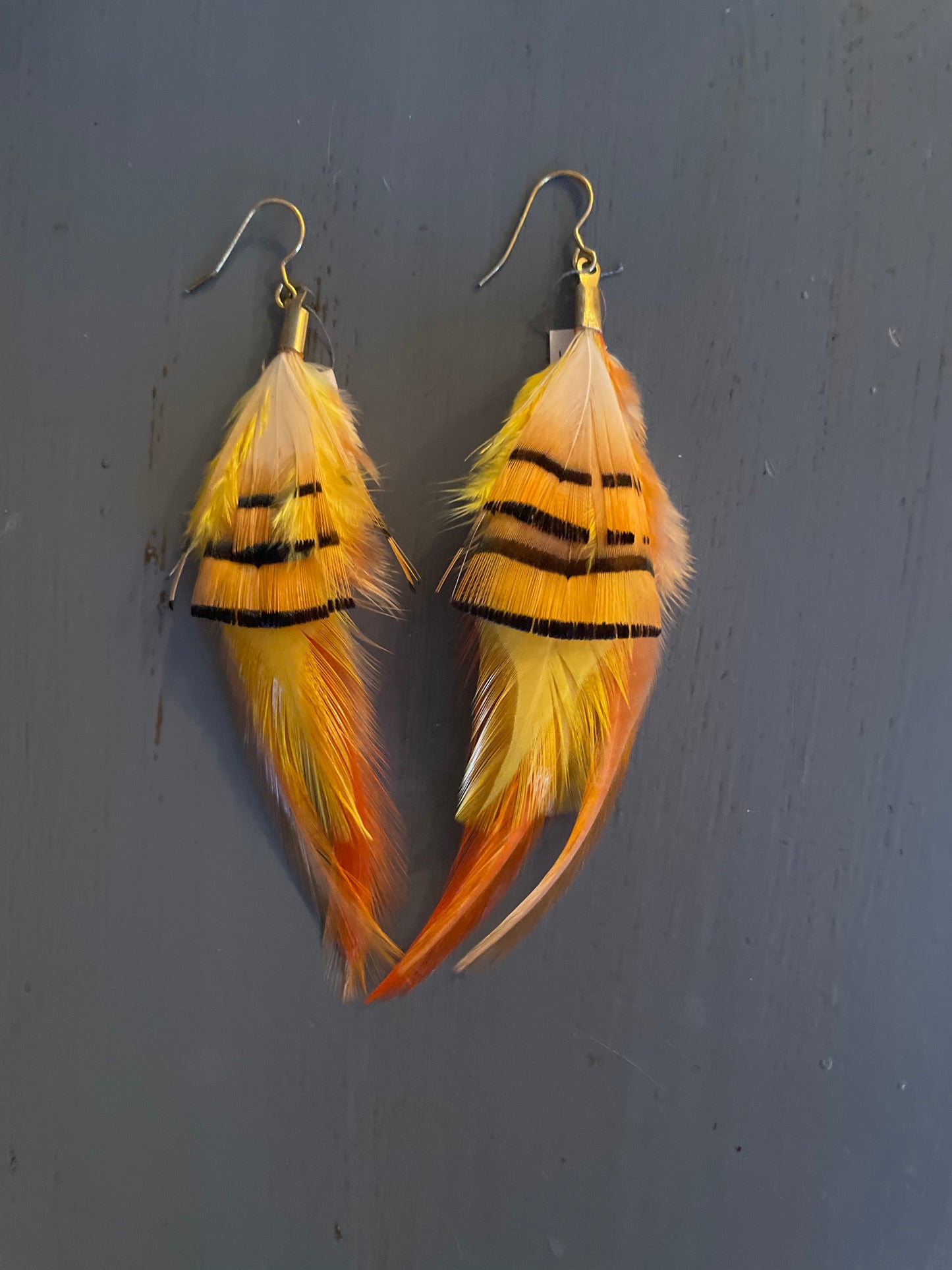 Fjäderörhängen korta