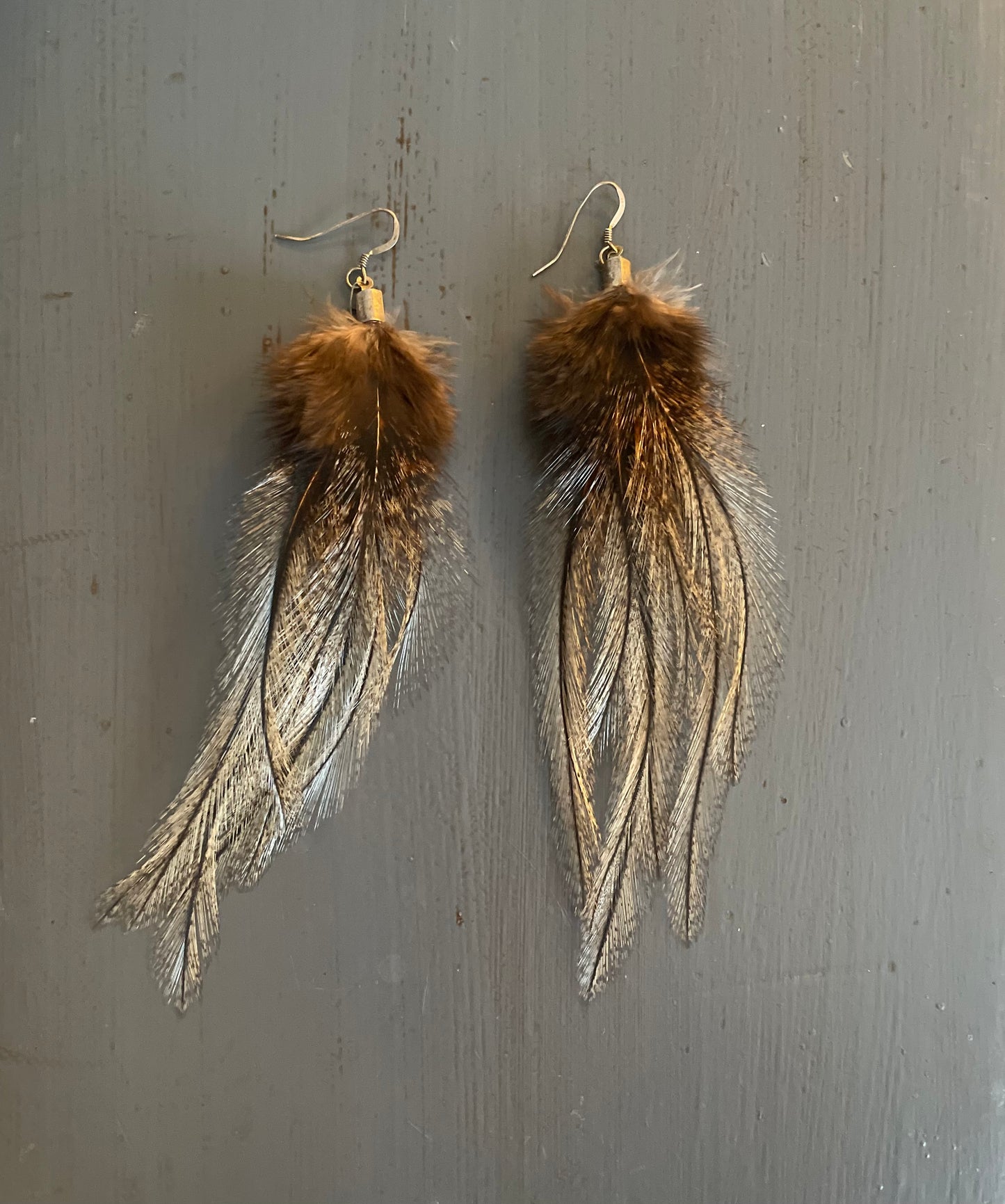 Fjäderörhängen korta